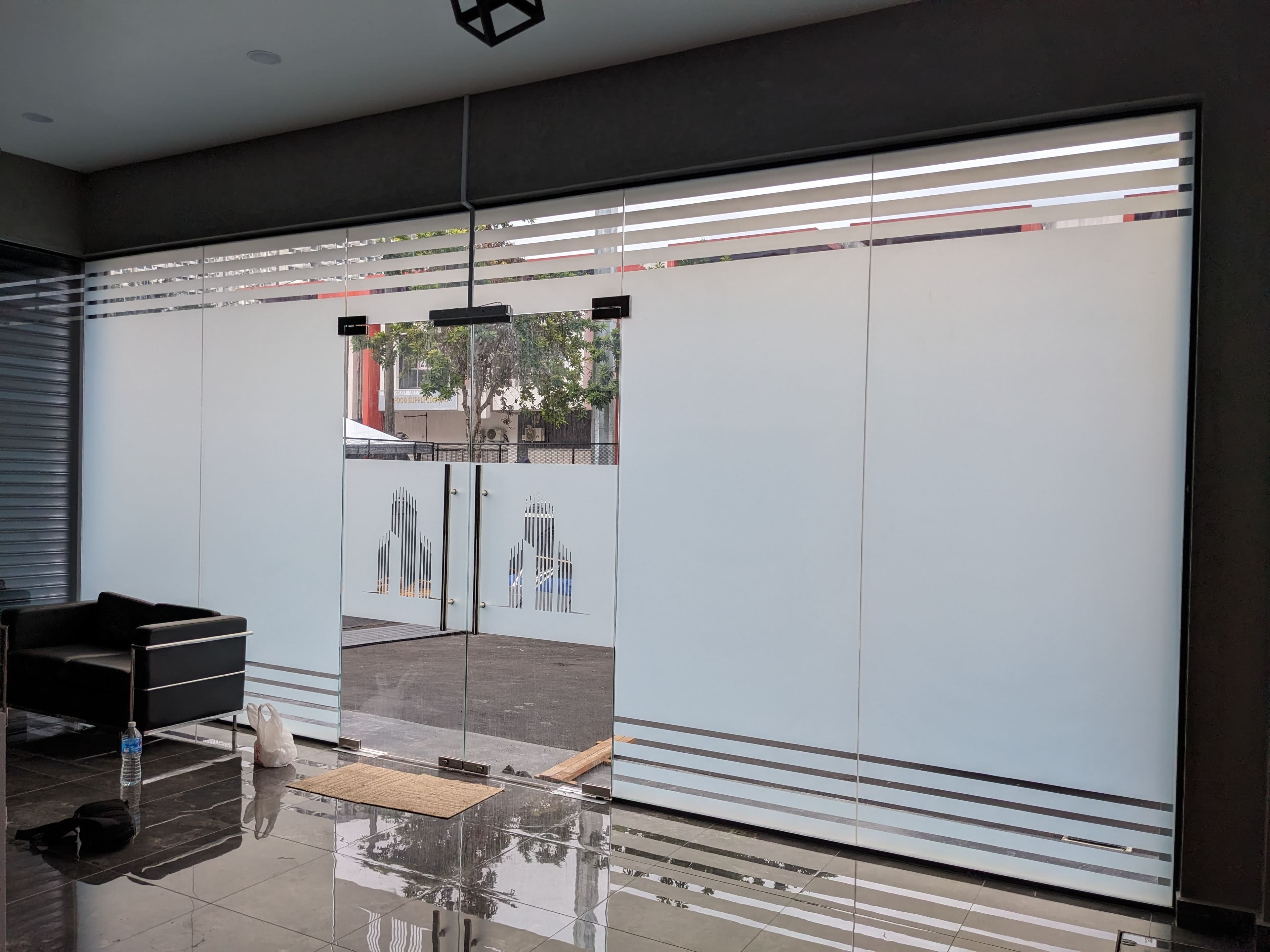 Office Tint Installation — Setapak, Kuala Lumpur - A mix of Nano Carbon and Frosted tint films for workspaces and meeting rooms, creating a modern aesthetic with maximum privacy.